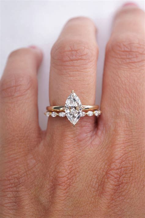 Marquise diamond wedding band. Things To Know About Marquise diamond wedding band. 